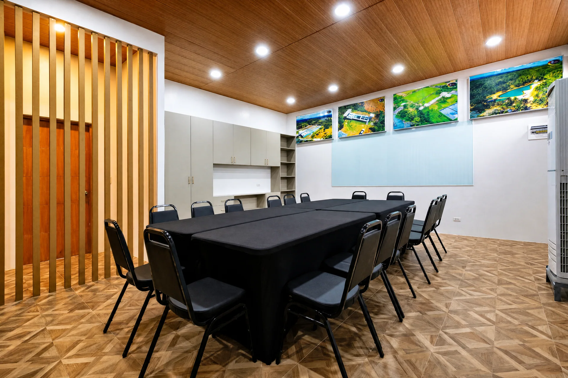 Conference room with timber dividers and black chairs
